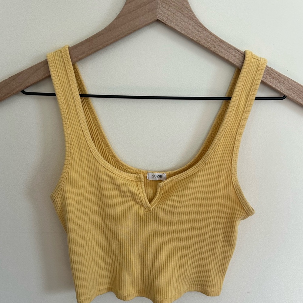 Yellow going out top
